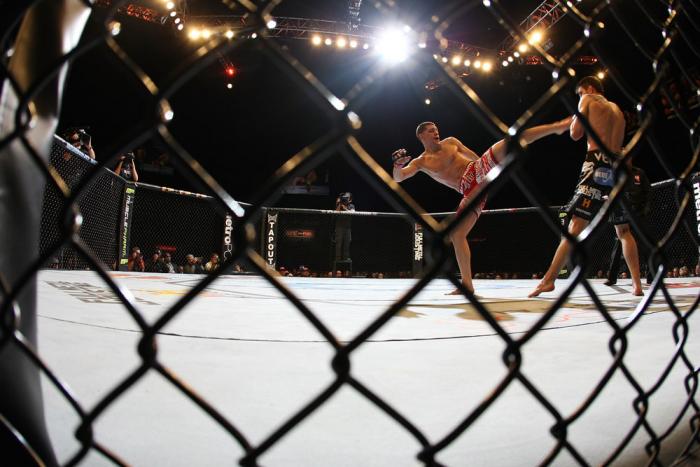 LAS VEGAS - FEBRUARY 04: (L-R) Nick Diaz kicks Carlos Condit during the UFC 143 event at Mandalay Bay Events Center on February 4, 2012 in Las Vegas, Nevada. (Photo by Nick Laham/Zuffa LLC/Zuffa LLC via Getty Images) *** Local Caption *** Nick Diaz; Car