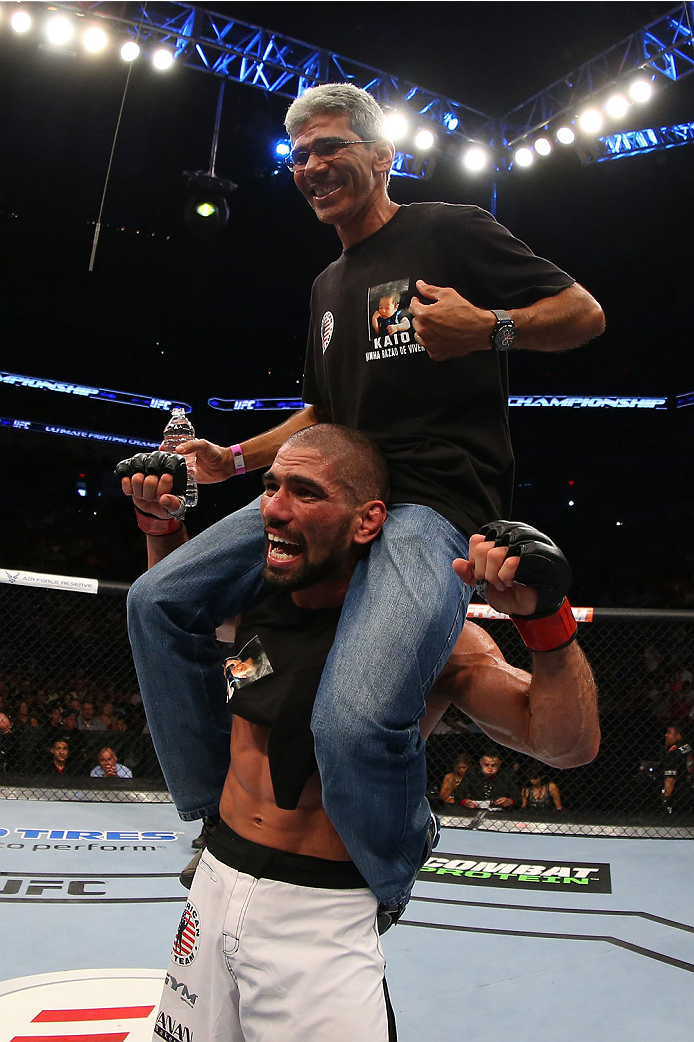 SAN ANTONIO, TX - JUNE 28: Marcelo Guimaraes (bottom) reacts after his victory over Andy Enz in their middleweight bout at the AT&T Center on June 28, 2014 in San Antonio, Texas. (Photo by Ed Mulholland/Zuffa LLC/Zuffa LLC via Getty Images)