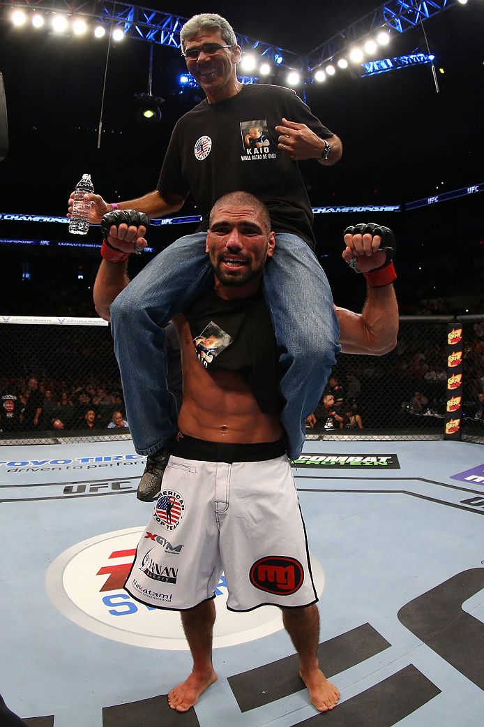 SAN ANTONIO, TX - JUNE 28: Marcelo Guimaraes (bottom) reacts after his victory over Andy Enz in their middleweight bout at the AT&T Center on June 28, 2014 in San Antonio, Texas. (Photo by Ed Mulholland/Zuffa LLC/Zuffa LLC via Getty Images)