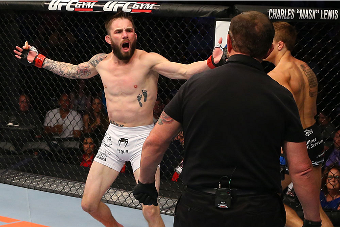 SAN ANTONIO, TX - JUNE 28: Johnny Bedford reacts to the referee's stoppage in his bantamweight bout at the AT&T Center on June 28, 2014 in San Antonio, Texas. (Photo by Ed Mulholland/Zuffa LLC/Zuffa LLC via Getty Images)