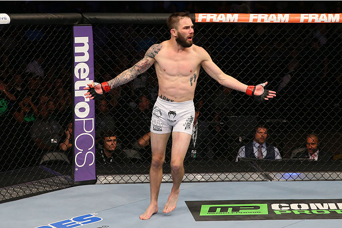 SAN ANTONIO, TX - JUNE 28: Johnny Bedford reacts to the referee's stoppage in his bantamweight bout at the AT&T Center on June 28, 2014 in San Antonio, Texas. (Photo by Ed Mulholland/Zuffa LLC/Zuffa LLC via Getty Images)