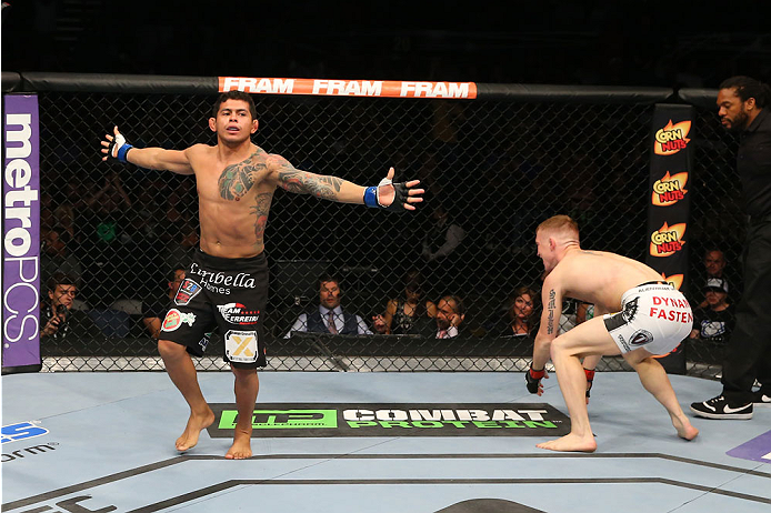 SAN ANTONIO, TX - JUNE 28: Carlos Diego Ferreira (left) reacts to his submission victory over Colton Smith (white shorts) in their lightweight bout at the AT&T Center on June 28, 2014 in San Antonio, Texas. (Photo by Ed Mulholland/Zuffa LLC/Zuffa LLC via