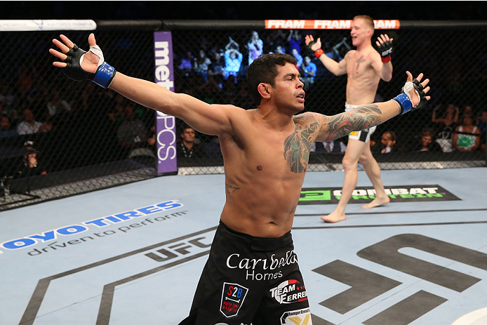 SAN ANTONIO, TX - JUNE 28: Carlos Diego Ferreira reacts to his victory over Colton Smith in their lightweight bout at the AT&T Center on June 28, 2014 in San Antonio, Texas. (Photo by Ed Mulholland/Zuffa LLC/Zuffa LLC via Getty Images)