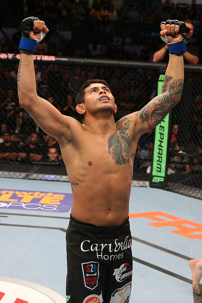 SAN ANTONIO, TX - JUNE 28: Carlos Diego Ferreira reacts to his victory over Colton Smith in their lightweight bout at the AT&T Center on June 28, 2014 in San Antonio, Texas. (Photo by Ed Mulholland/Zuffa LLC/Zuffa LLC via Getty Images)