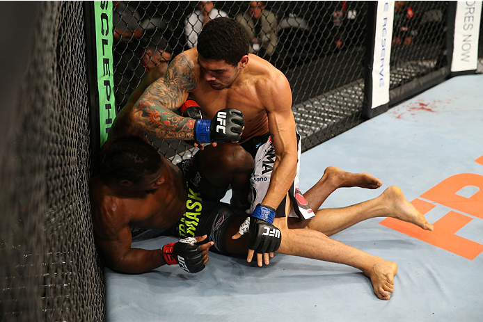 SAN ANTONIO, TX - JUNE 28: Antonio Braga Neto (top) elbows Clint Hester in their middleweight bout at the AT&T Center on June 28, 2014 in San Antonio, Texas. (Photo by Ed Mulholland/Zuffa LLC/Zuffa LLC via Getty Images)