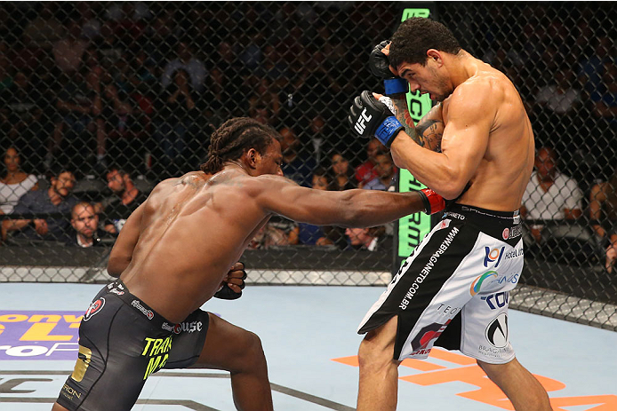 SAN ANTONIO, TX - JUNE 28: (L-R) Clint Hester punches Antonio Braga Neto in their middleweight bout at the AT&T Center on June 28, 2014 in San Antonio, Texas. (Photo by Ed Mulholland/Zuffa LLC/Zuffa LLC via Getty Images)