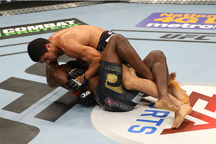 SAN ANTONIO, TX - JUNE 28: Antonio Braga Neto (top) attempts to submit Clint Hester in their middleweight bout at the AT&T Center on June 28, 2014 in San Antonio, Texas. (Photo by Ed Mulholland/Zuffa LLC/Zuffa LLC via Getty Images)