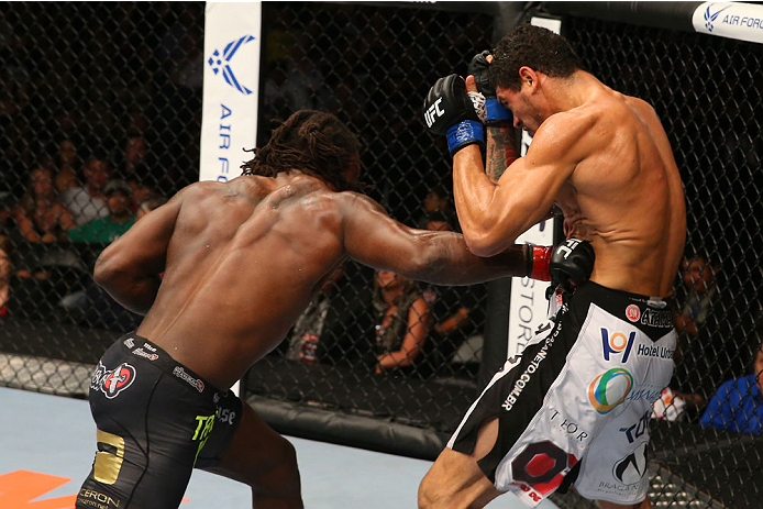 SAN ANTONIO, TX - JUNE 28: (L-R) Clint Hester punches Antonio Braga Neto in their middleweight bout at the AT&T Center on June 28, 2014 in San Antonio, Texas. (Photo by Ed Mulholland/Zuffa LLC/Zuffa LLC via Getty Images)