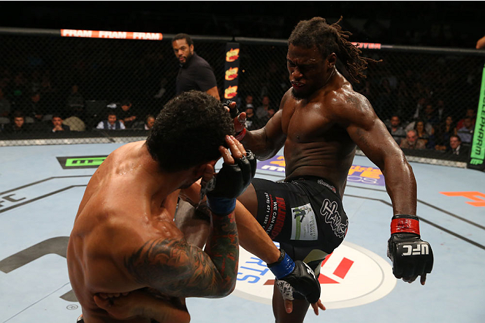 SAN ANTONIO, TX - JUNE 28: (R-L) Clint Hester kicks Antonio Braga Neto in their middleweight bout at the AT&T Center on June 28, 2014 in San Antonio, Texas. (Photo by Ed Mulholland/Zuffa LLC/Zuffa LLC via Getty Images)