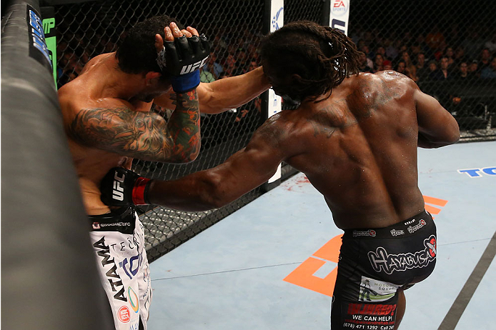 SAN ANTONIO, TX - JUNE 28: (R-L) Clint Hester punches Antonio Braga Neto in their middleweight bout at the AT&T Center on June 28, 2014 in San Antonio, Texas. (Photo by Ed Mulholland/Zuffa LLC/Zuffa LLC via Getty Images)