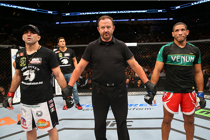 SAN ANTONIO, TX - JUNE 28: Ricardo Lamas (left) and Hacran Dias (right) await the official decision in their featherweight bout at the AT&T Center on June 28, 2014 in San Antonio, Texas. (Photo by Ed Mulholland/Zuffa LLC/Zuffa LLC via Getty Images)