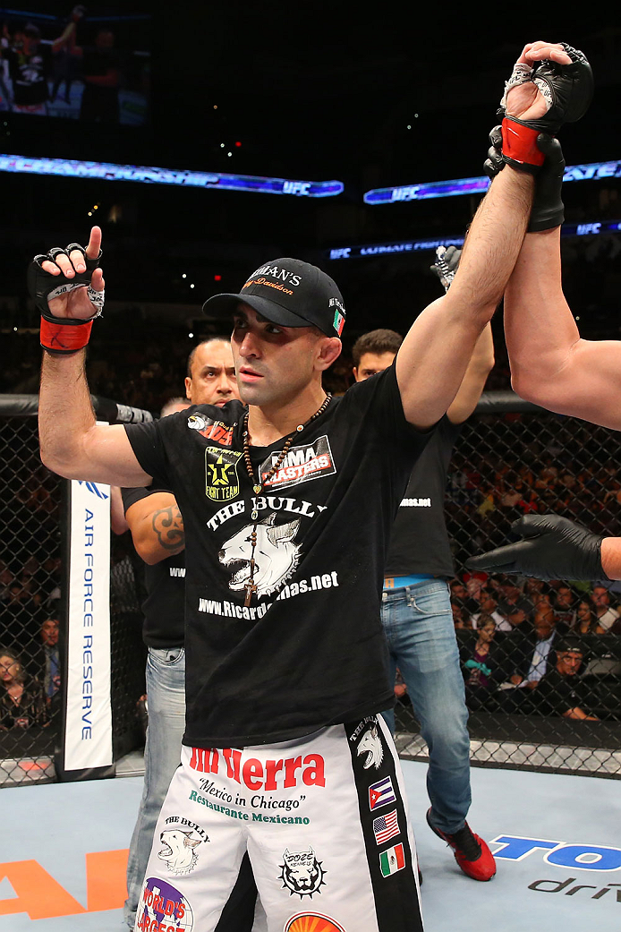SAN ANTONIO, TX - JUNE 28: Ricardo Lamas reacts to his victory over Hacran Dias in their featherweight bout at the AT&T Center on June 28, 2014 in San Antonio, Texas. (Photo by Ed Mulholland/Zuffa LLC/Zuffa LLC via Getty Images)
