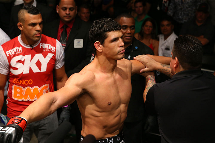 SAN ANTONIO, TX - JUNE 28: Cezar Ferreira (center) prepares to enter the Octagon as training partner Vitor Belfort looks on at the AT&T Center on June 28, 2014 in San Antonio, Texas. (Photo by Ed Mulholland/Zuffa LLC/Zuffa LLC via Getty Images)