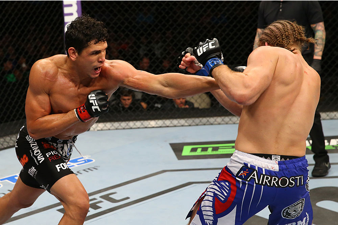 SAN ANTONIO, TX - JUNE 28: (L-R) Cezar Ferreira punches Andrew Craig in their middleweight bout at the AT&T Center on June 28, 2014 in San Antonio, Texas. (Photo by Ed Mulholland/Zuffa LLC/Zuffa LLC via Getty Images)