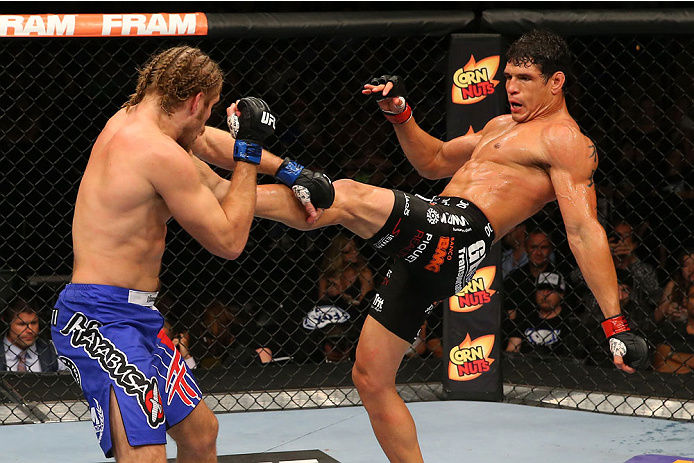SAN ANTONIO, TX - JUNE 28: (R-L) Cezar Ferreira kicks Andrew Craig in their middleweight bout at the AT&T Center on June 28, 2014 in San Antonio, Texas. (Photo by Ed Mulholland/Zuffa LLC/Zuffa LLC via Getty Images)