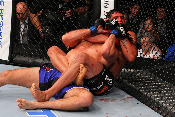 SAN ANTONIO, TX - JUNE 28: Cezar Ferreira (black shorts) attempts to submit Andrew Craig in their middleweight bout at the AT&T Center on June 28, 2014 in San Antonio, Texas. (Photo by Ed Mulholland/Zuffa LLC/Zuffa LLC via Getty Images)