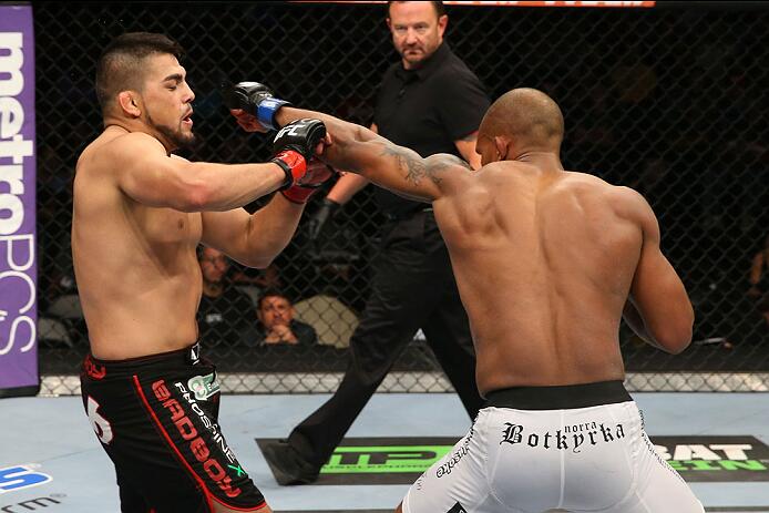 SAN ANTONIO, TX - JUNE 28: (R-L) Nico Musoke punches Kelvin Gastelum in their welterweight bout at the AT&T Center on June 28, 2014 in San Antonio, Texas. (Photo by Ed Mulholland/Zuffa LLC/Zuffa LLC via Getty Images)