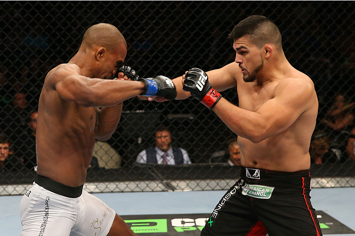 SAN ANTONIO, TX - JUNE 28: (R-L) Kelvin Gastelum punches Nico Musoke in their welterweight bout at the AT&T Center on June 28, 2014 in San Antonio, Texas. (Photo by Ed Mulholland/Zuffa LLC/Zuffa LLC via Getty Images)
