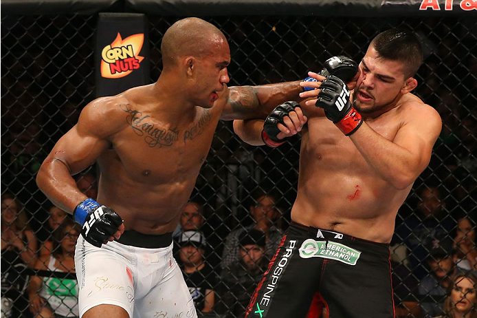SAN ANTONIO, TX - JUNE 28: (L-R) Nico Musoke punches Kelvin Gastelum in their welterweight bout at the AT&T Center on June 28, 2014 in San Antonio, Texas. (Photo by Ed Mulholland/Zuffa LLC/Zuffa LLC via Getty Images)
