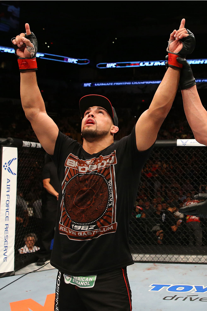 SAN ANTONIO, TX - JUNE 28: Kelvin Gastelum reacts to his victory over Nico Musoke in their welterweight bout at the AT&T Center on June 28, 2014 in San Antonio, Texas. (Photo by Ed Mulholland/Zuffa LLC/Zuffa LLC via Getty Images)