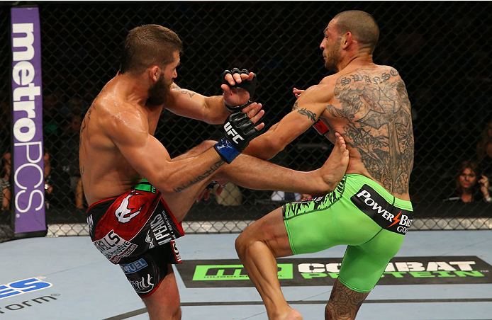 SAN ANTONIO, TX - JUNE 28: (L-R) Jeremy Stephens kicks Cub Swanson in their featherweight bout at the AT&T Center on June 28, 2014 in San Antonio, Texas. (Photo by Ed Mulholland/Zuffa LLC/Zuffa LLC via Getty Images)