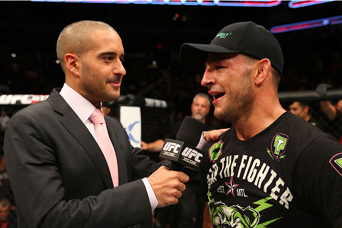 SAN ANTONIO, TX - JUNE 28: Cub Swanson (right) speaks with Jon Anik after his featherweight bout at the AT&T Center on June 28, 2014 in San Antonio, Texas. (Photo by Ed Mulholland/Zuffa LLC/Zuffa LLC via Getty Images)