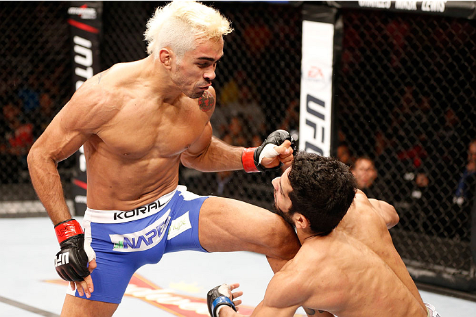 NATAL, BRAZIL - MARCH 23: (L-R) Godofredo "Pepey" Castro knocks out Noad Lahat with a flying knee in their featherweight bout during the UFC Fight Night event at Ginasio Nelio Dias on March 23, 2014 in Natal, Brazil. (Photo by Josh Hedges/Zuffa LLC/Zuffa