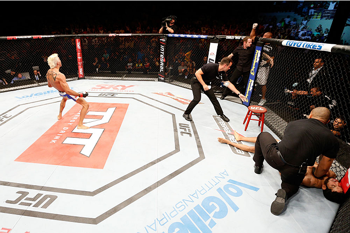 NATAL, BRAZIL - MARCH 23: Godofredo "Pepey" Castro (L) reacts after his knockout victory over Noad Lahat in their featherweight bout during the UFC Fight Night event at Ginasio Nelio Dias on March 23, 2014 in Natal, Brazil. (Photo by Josh Hedges/Zuffa LL