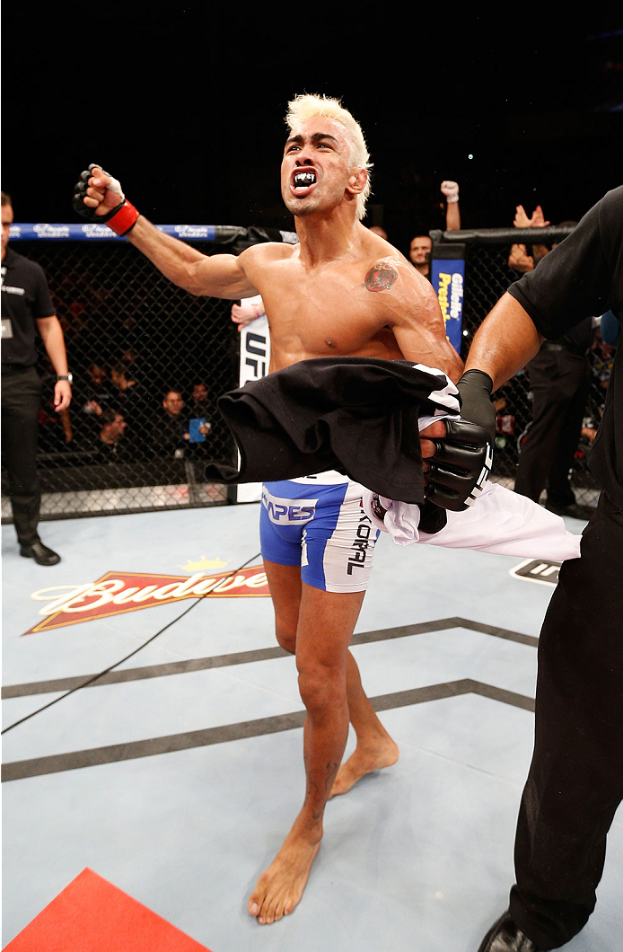 NATAL, BRAZIL - MARCH 23: Godofredo "Pepey" Castro reacts after his knockout victory over Noad Lahat in their featherweight bout during the UFC Fight Night event at Ginasio Nelio Dias on March 23, 2014 in Natal, Brazil. (Photo by Josh Hedges/Zuffa LLC/Zu