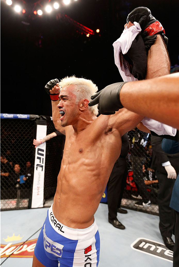 NATAL, BRAZIL - MARCH 23: Godofredo "Pepey" Castro reacts after his knockout victory over Noad Lahat in their featherweight bout during the UFC Fight Night event at Ginasio Nelio Dias on March 23, 2014 in Natal, Brazil. (Photo by Josh Hedges/Zuffa LLC/Zu