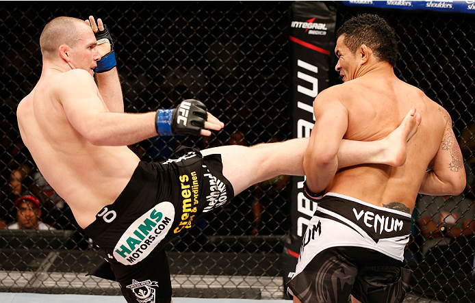 NATAL, BRAZIL - MARCH 23: (L-R) Hans Stringer kicks Francimar Barroso in their light heavyweight bout during the UFC Fight Night event at Ginasio Nelio Dias on March 23, 2014 in Natal, Brazil. (Photo by Josh Hedges/Zuffa LLC/Zuffa LLC via Getty Images)