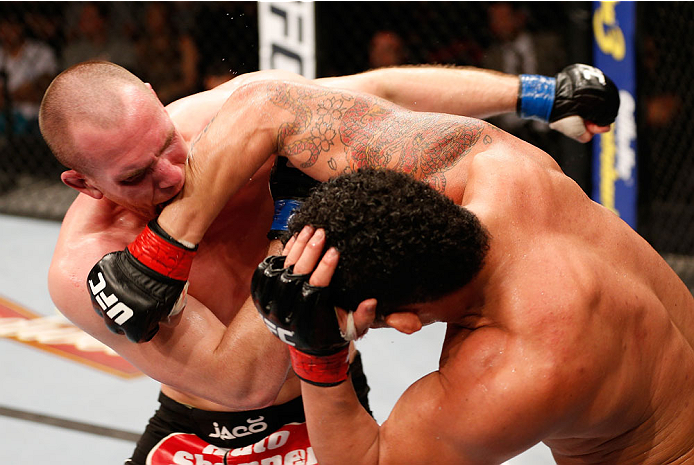 NATAL, BRAZIL - MARCH 23: (R-L) Francimar Barroso punches Hans Stringer in their light heavyweight bout during the UFC Fight Night event at Ginasio Nelio Dias on March 23, 2014 in Natal, Brazil. (Photo by Josh Hedges/Zuffa LLC/Zuffa LLC via Getty Images)