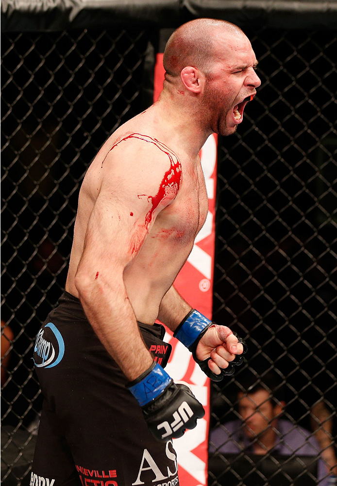 NATAL, BRAZIL - MARCH 23: Kenny Robertson reacts after his submission victory over Thiago Perpetuo in their welterweight bout during the UFC Fight Night event at Ginasio Nelio Dias on March 23, 2014 in Natal, Brazil. (Photo by Josh Hedges/Zuffa LLC/Zuffa