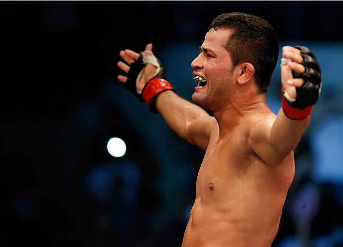 NATAL, BRAZIL - MARCH 23: Jussier Formiga reacts after his submission victory over Scott Jorgensen in their flyweight bout during the UFC Fight Night event at Ginasio Nelio Dias on March 23, 2014 in Natal, Brazil. (Photo by Josh Hedges/Zuffa LLC/Zuffa LL