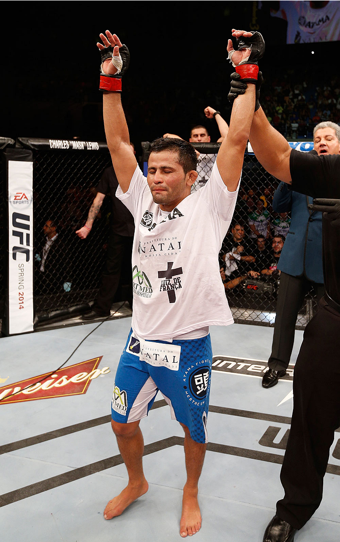 NATAL, BRAZIL - MARCH 23: Jussier Formiga reacts after his submission victory over Scott Jorgensen in their flyweight bout during the UFC Fight Night event at Ginasio Nelio Dias on March 23, 2014 in Natal, Brazil. (Photo by Josh Hedges/Zuffa LLC/Zuffa LL