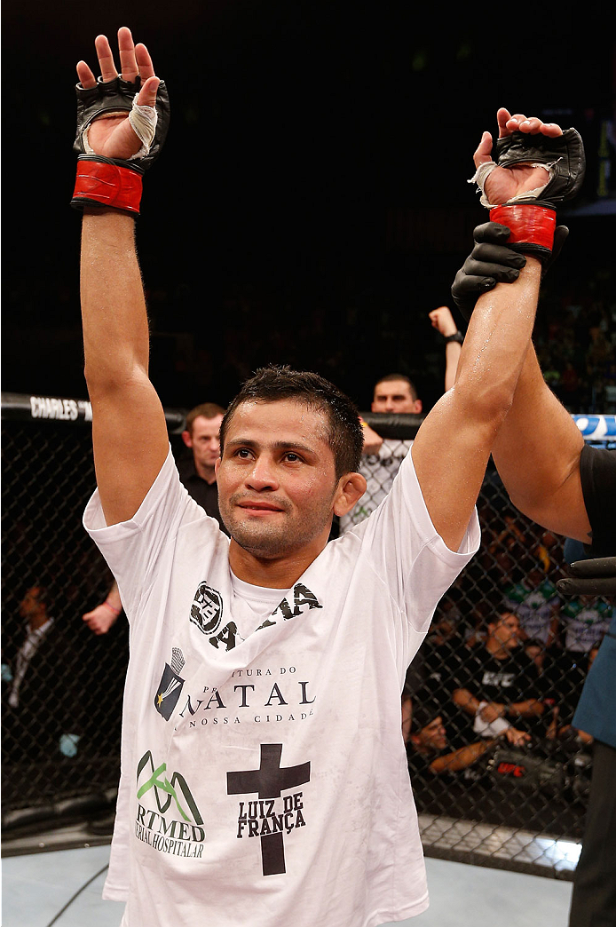 NATAL, BRAZIL - MARCH 23: Jussier Formiga reacts after his submission victory over Scott Jorgensen in their flyweight bout during the UFC Fight Night event at Ginasio Nelio Dias on March 23, 2014 in Natal, Brazil. (Photo by Josh Hedges/Zuffa LLC/Zuffa LL