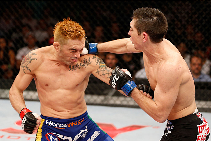 NATAL, BRAZIL - MARCH 23: (R-L) Steven Siler punches Rony "Jason" Mariano-Bazzera in their featherweight bout during the UFC Fight Night event at Ginasio Nelio Dias on March 23, 2014 in Natal, Brazil. (Photo by Josh Hedges/Zuffa LLC/Zuffa LLC via Getty I