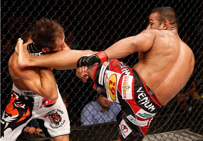 NATAL, BRAZIL - MARCH 23: (R-L) Michel Prazeres kicks Maribek Taisumov in their lightweight bout during the UFC Fight Night event at Ginasio Nelio Dias on March 23, 2014 in Natal, Brazil. (Photo by Josh Hedges/Zuffa LLC/Zuffa LLC via Getty Images)