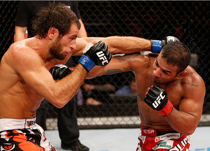 NATAL, BRAZIL - MARCH 23: (R-L) Michel Prazeres punches Maribek Taisumov in their lightweight bout during the UFC Fight Night event at Ginasio Nelio Dias on March 23, 2014 in Natal, Brazil. (Photo by Josh Hedges/Zuffa LLC/Zuffa LLC via Getty Images)