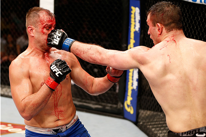 NATAL, BRAZIL - MARCH 23: (R-L) Gian Villante punches Fabio Maldonado in their light heavyweight bout during the UFC Fight Night event at Ginasio Nelio Dias on March 23, 2014 in Natal, Brazil. (Photo by Josh Hedges/Zuffa LLC/Zuffa LLC via Getty Images)