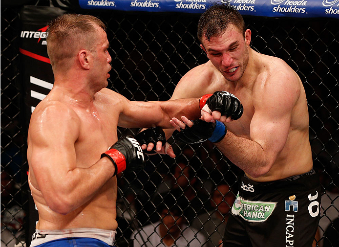 NATAL, BRAZIL - MARCH 23: (L-R) Fabio Maldonado punches Gian Villante in their light heavyweight bout during the UFC Fight Night event at Ginasio Nelio Dias on March 23, 2014 in Natal, Brazil. (Photo by Josh Hedges/Zuffa LLC/Zuffa LLC via Getty Images)