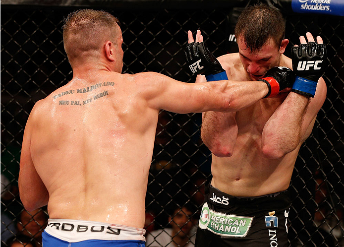 NATAL, BRAZIL - MARCH 23: (L-R) Fabio Maldonado punches Gian Villante in their light heavyweight bout during the UFC Fight Night event at Ginasio Nelio Dias on March 23, 2014 in Natal, Brazil. (Photo by Josh Hedges/Zuffa LLC/Zuffa LLC via Getty Images)