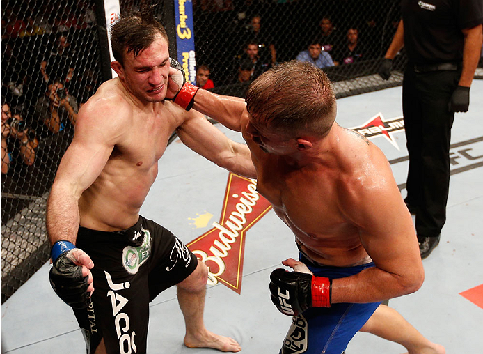 NATAL, BRAZIL - MARCH 23: (R-L) Fabio Maldonado punches Gian Villante in their light heavyweight bout during the UFC Fight Night event at Ginasio Nelio Dias on March 23, 2014 in Natal, Brazil. (Photo by Josh Hedges/Zuffa LLC/Zuffa LLC via Getty Images)