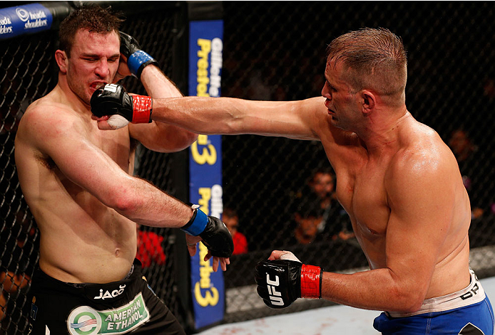 NATAL, BRAZIL - MARCH 23: (R-L) Fabio Maldonado punches Gian Villante in their light heavyweight bout during the UFC Fight Night event at Ginasio Nelio Dias on March 23, 2014 in Natal, Brazil. (Photo by Josh Hedges/Zuffa LLC/Zuffa LLC via Getty Images)
