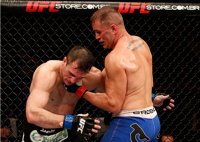 NATAL, BRAZIL - MARCH 23: (R-L) Fabio Maldonado punches Gian Villante in their light heavyweight bout during the UFC Fight Night event at Ginasio Nelio Dias on March 23, 2014 in Natal, Brazil. (Photo by Josh Hedges/Zuffa LLC/Zuffa LLC via Getty Images)