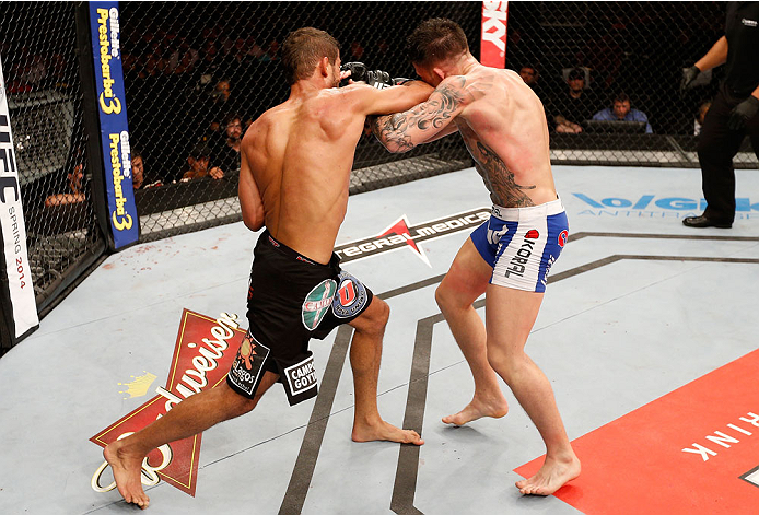 NATAL, BRAZIL - MARCH 23: (L-R) Leonardo Santos elbows Norman Parke in their lightweight bout during the UFC Fight Night event at Ginasio Nelio Dias on March 23, 2014 in Natal, Brazil. (Photo by Josh Hedges/Zuffa LLC/Zuffa LLC via Getty Images)