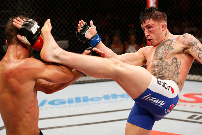 NATAL, BRAZIL - MARCH 23: (R-L) Norman Parke kicks Leonardo Santos in their lightweight bout during the UFC Fight Night event at Ginasio Nelio Dias on March 23, 2014 in Natal, Brazil. (Photo by Josh Hedges/Zuffa LLC/Zuffa LLC via Getty Images)