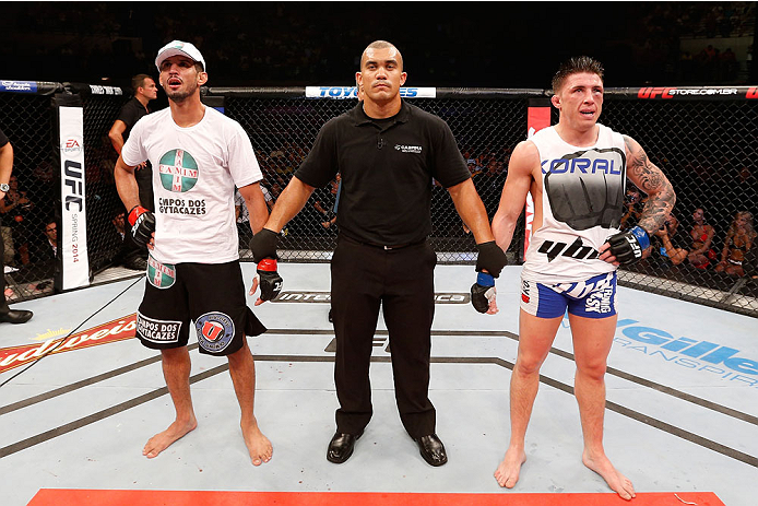NATAL, BRAZIL - MARCH 23: Opponents Leonardo Santos (L) and Norman Parke (R) react as their lightweight bout is declared a draw during the UFC Fight Night event at Ginasio Nelio Dias on March 23, 2014 in Natal, Brazil. (Photo by Josh Hedges/Zuffa LLC/Zuf
