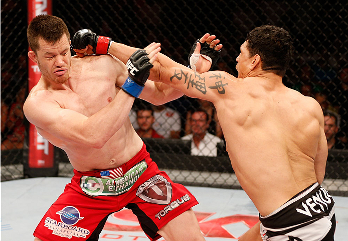 NATAL, BRAZIL - MARCH 23: (R-L) Cezar "Mutante" Ferreira punches CB Dollaway in their middleweight bout during the UFC Fight Night event at Ginasio Nelio Dias on March 23, 2014 in Natal, Brazil. (Photo by Josh Hedges/Zuffa LLC/Zuffa LLC via Getty Images)