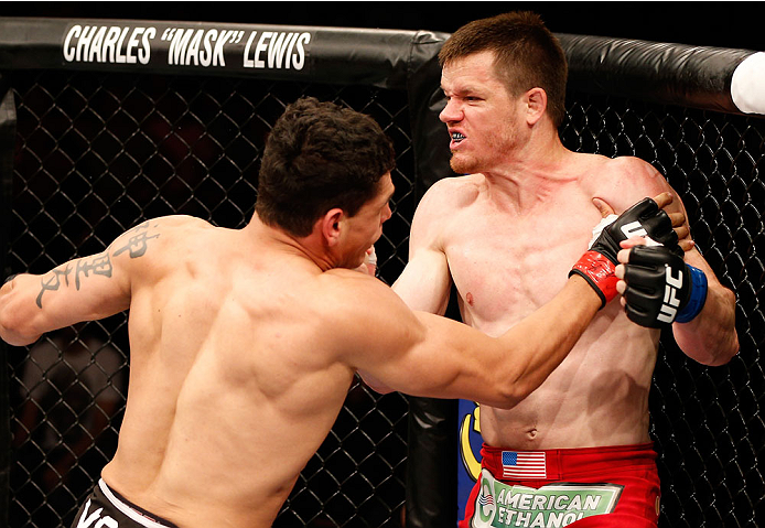 NATAL, BRAZIL - MARCH 23: (R-L) CB Dollaway punches Cezar "Mutante" Ferreira in their middleweight bout during the UFC Fight Night event at Ginasio Nelio Dias on March 23, 2014 in Natal, Brazil. (Photo by Josh Hedges/Zuffa LLC/Zuffa LLC via Getty Images)